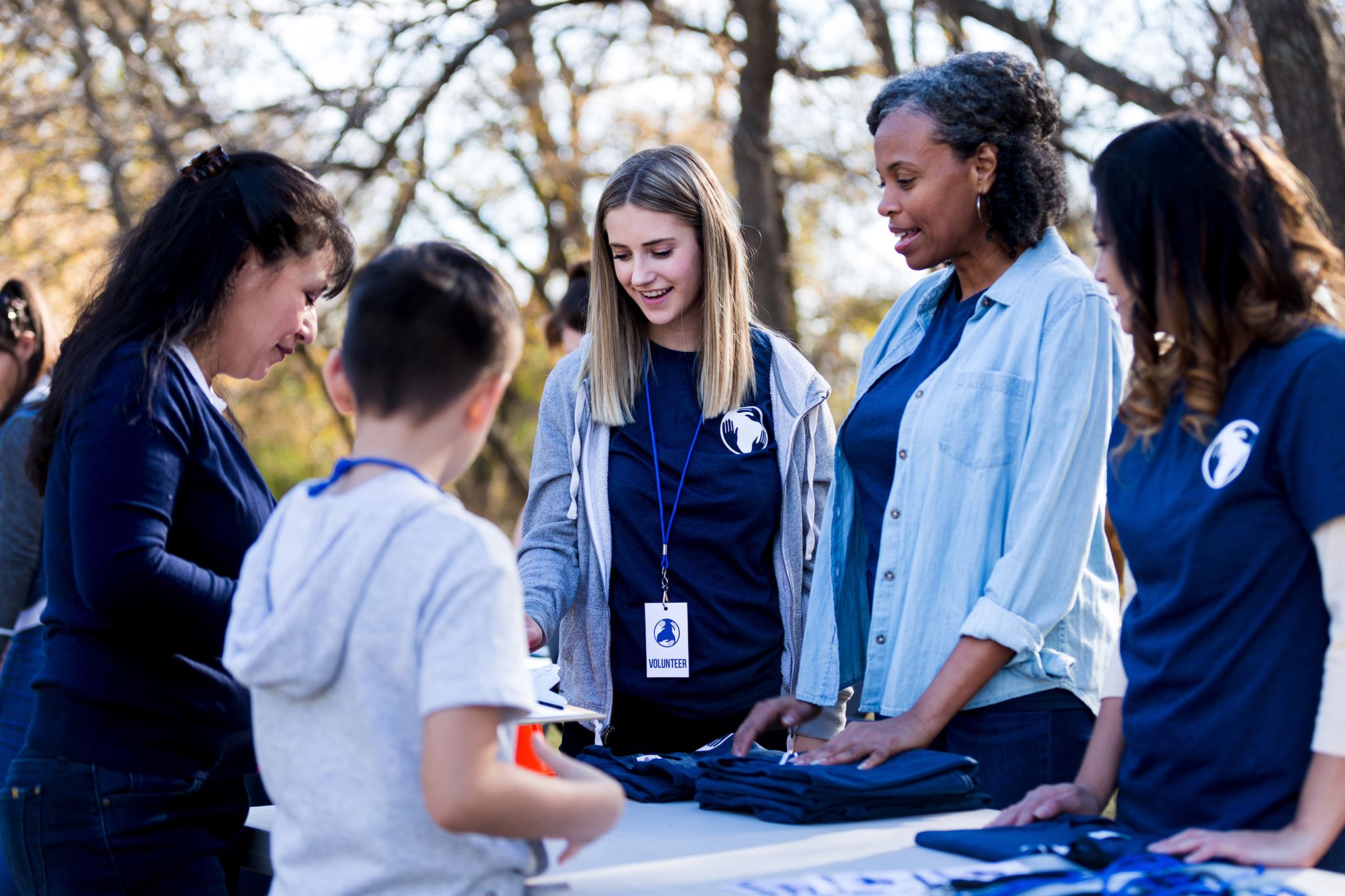 Employee volunteering in community event